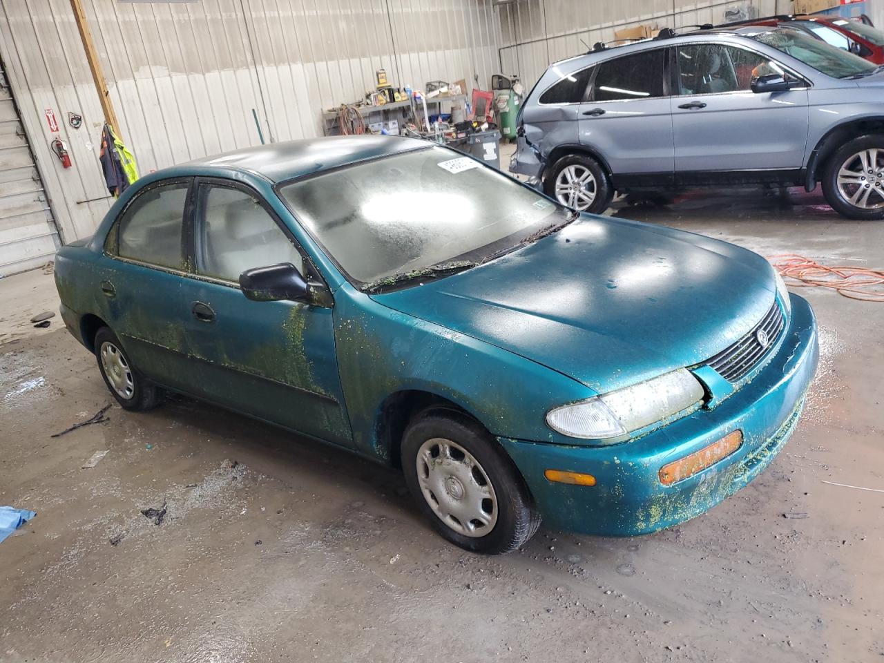 1995 MAZDA PROTEGE DX - JM1BA1415S0103061