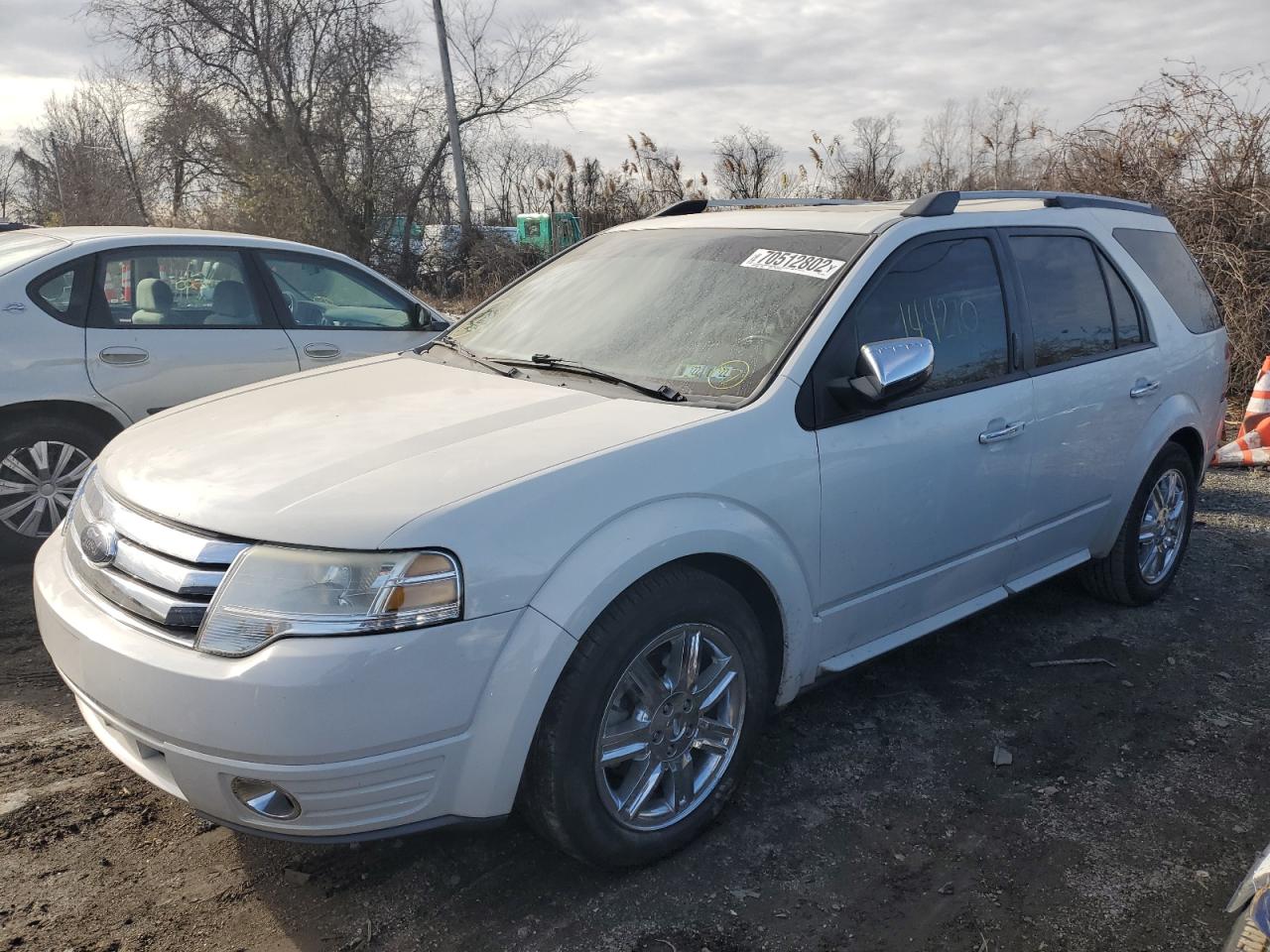 2009 FORD TAURUS X L - 1FMDK06WX9GA01485 — photo 1