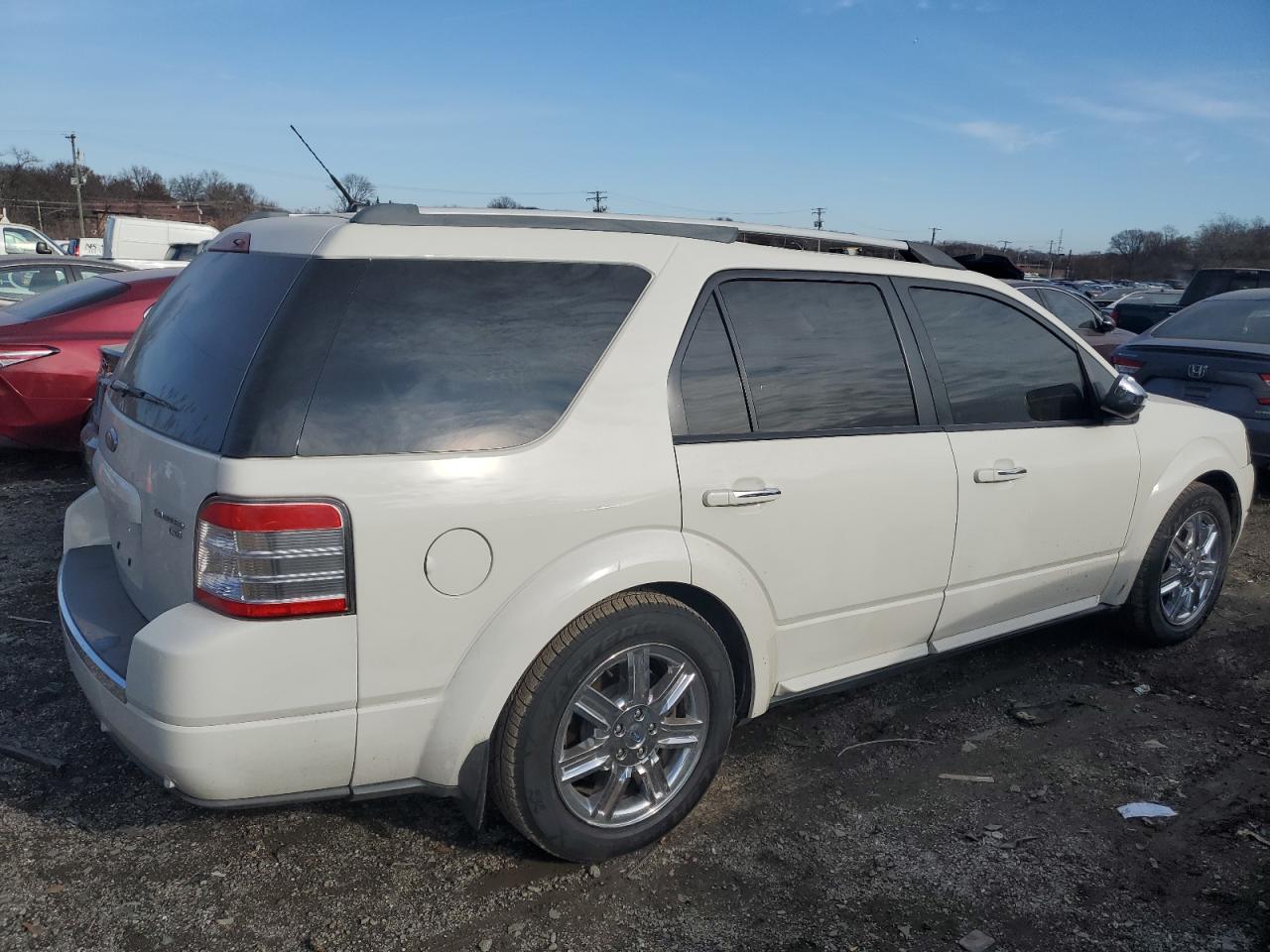2009 FORD TAURUS X L - 1FMDK06WX9GA01485 — photo 3