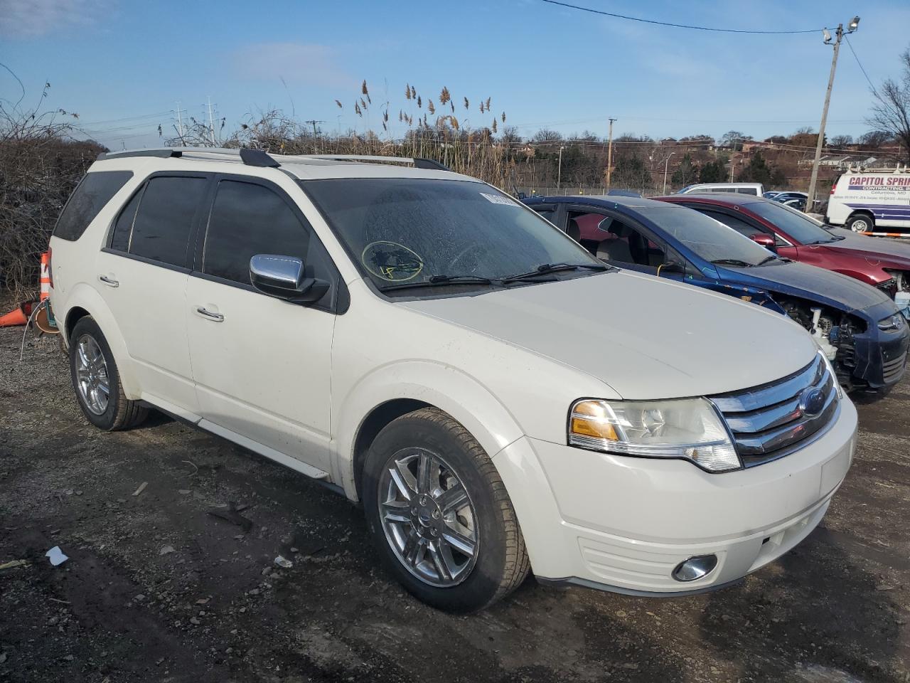 2009 FORD TAURUS X L - 1FMDK06WX9GA01485 — photo 4